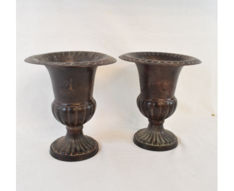 A pair of metal urns, 22 cm high, an oval bust portrait of a gentleman, a bugle, a carriage clock and other items (box) 
