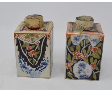 A 19th century tin glazed tea caddy and cover, 10.5 cm high, another similar, a pair of Delft plates and similar items (box) 