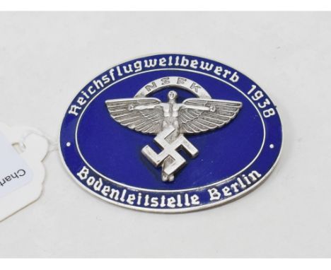 A Nazi National Socialist Flyer Corp (NSFK) enamel badge, marked ROB NEFF, Berlin WS7 