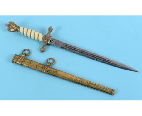 A German Third Reich naval officer's dirk, the engraved blade signed Eickhorn Solingen, with a brass scabbard See illustratio