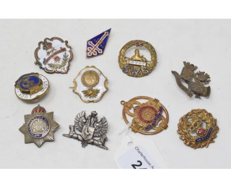 Ten sweetheart and enamel badges, including SWB, RWF and Hampshire Regiment 