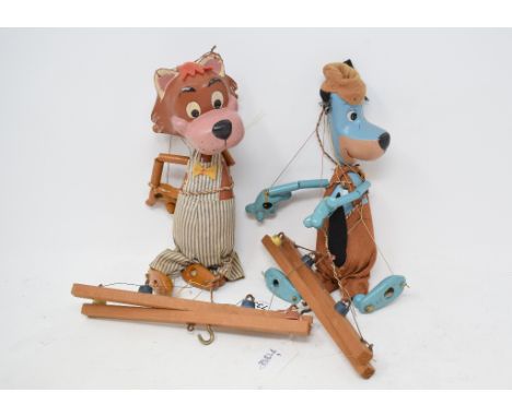 A Pelham Puppets Huckleberry Hound, boxed, and another, Mr Jinks The Cat (2)Report by GHSome light wear and crazing to paint 
