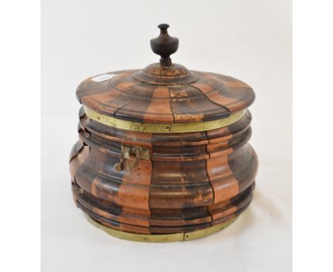 A 19th century Dutch tobacco box, of compressed circular form, 17 cm diameter, and a pipe (2) 