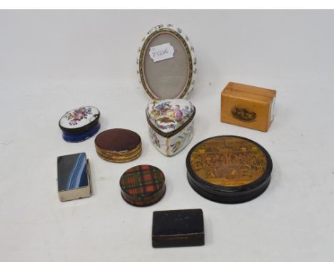 A 19th century enamel picture box, with floral decoration, 5.5 cm wide, a similar heart shaped box, two agate snuff boxes, a 