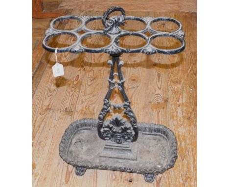 An eight division cast metal stick stand, 44 cm 