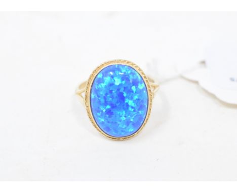 A 9ct gold and Gilson black opal ring, approx. ring size MReport by NGModern 