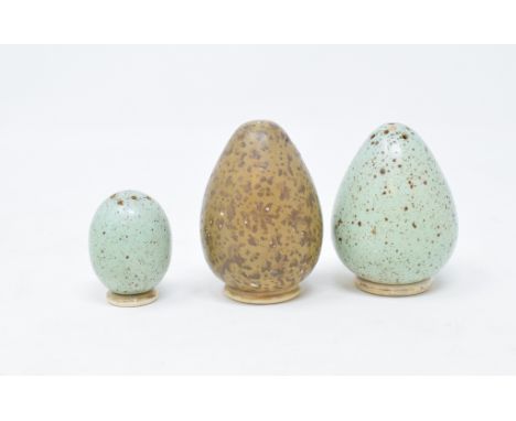 A set of three ceramic pepperettes, in the form of eggs, the largest 5 cm high (3) 