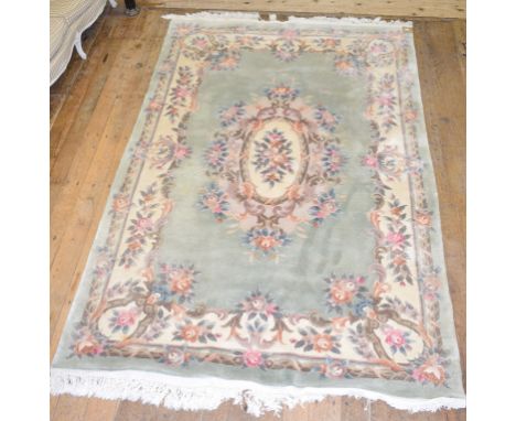 A Chinese rug, decorated flowers and foliage on a light coloured ground, 282 x 182 cm and other assorted rugs (6) 