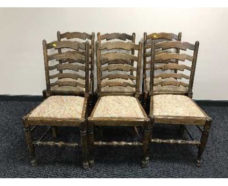Six oak ladder back country chairs 