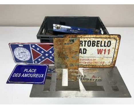 A box of tools, metal signs etc 