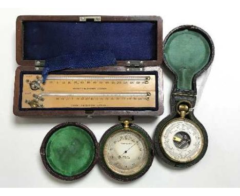 Two pocket compensated barometers, in original cases, together with a maximum minimum thermometer set in case by Negretti & Z