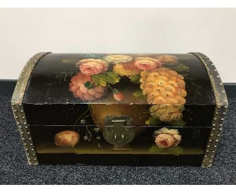 A painted dome topped trunk and four rolls of wall paper 