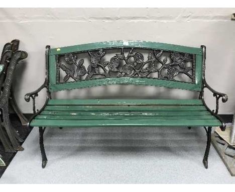 A metal and wooden garden bench