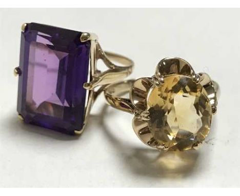 Two 9ct gold dress rings set with citrine and amethyst. (2)