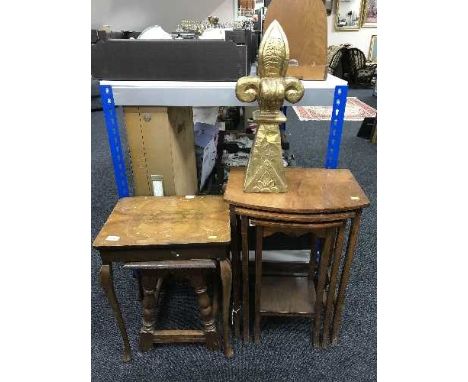 A nest of tables, oak stool and a gilt finial 