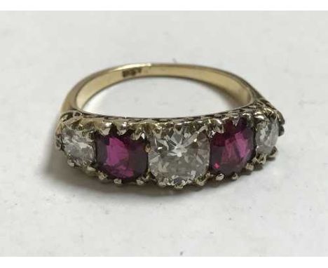 A fine 18ct gold ruby and diamond ring, the central stone approximately 1.1ct.