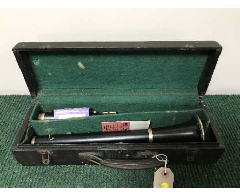 A wooden clarinet in box 