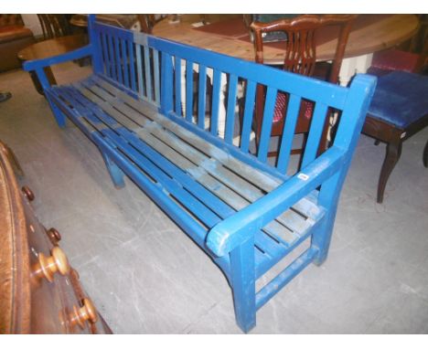 A LARGE PAINTED BENCH