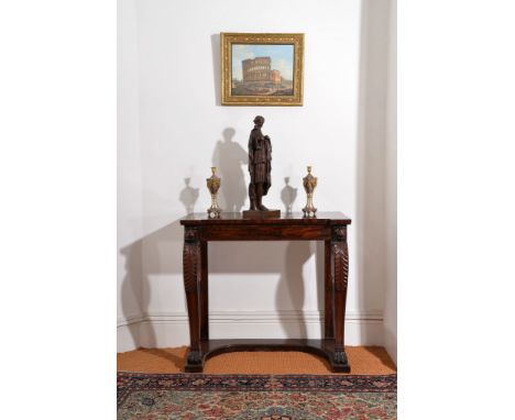 Ω A George III mahogany console table, circa 1810, after a design by Thomas Hope, the rectangular inverted breakfront top abo