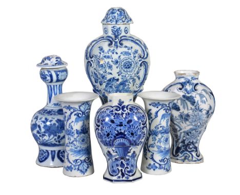 A selection of Dutch Delft , 18th and 19th century, comprising: a pair of waisted sleeve vases with everted rims painted with