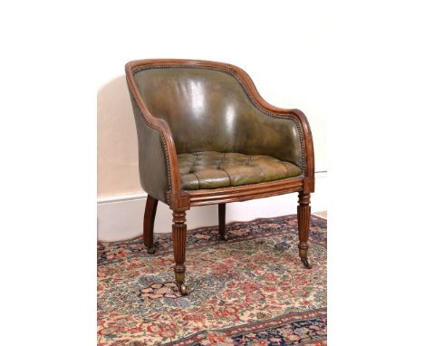  A George IV mahogany tub armchair,   circa 1825, in the manner of Gillows, the moulded frame incorporating downswept arms an