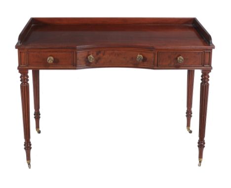  A George IV mahogany dressing table,   circa 1825, attributed to Gillows, the moulded three quarter gallery above the rectan