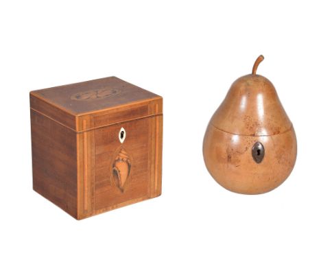 A George III pearwood tea caddy , late 18th century, in the form of a pear, the hinged lid with carved stalk, opening to a me