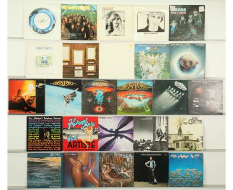 A collection of 40+ Classic Rock LPs to include artists; Eric Clapton, Santana, Boston, Gerry Rafferty, Peter Frampton, Tom P