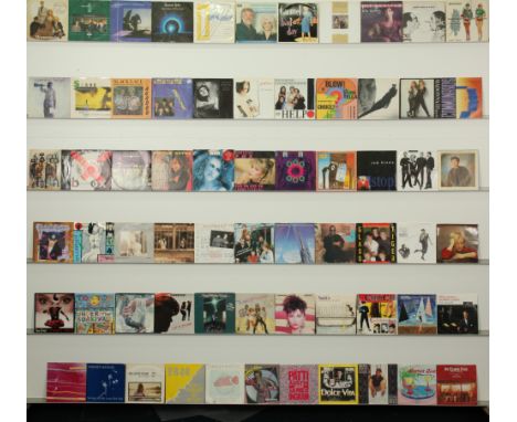 A collection of 1980's Pop Chart Hits 7" Singles. Includes artists: UB40, Taylor Dane, Adam And The Ants, Europe, Nik Kershaw
