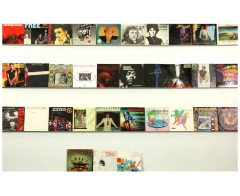 A collection of Mixed Rock 7" Singles - late 1960's to 1980's. Includes artists: Wings, Bruce Springsteen, David Essex, Statu