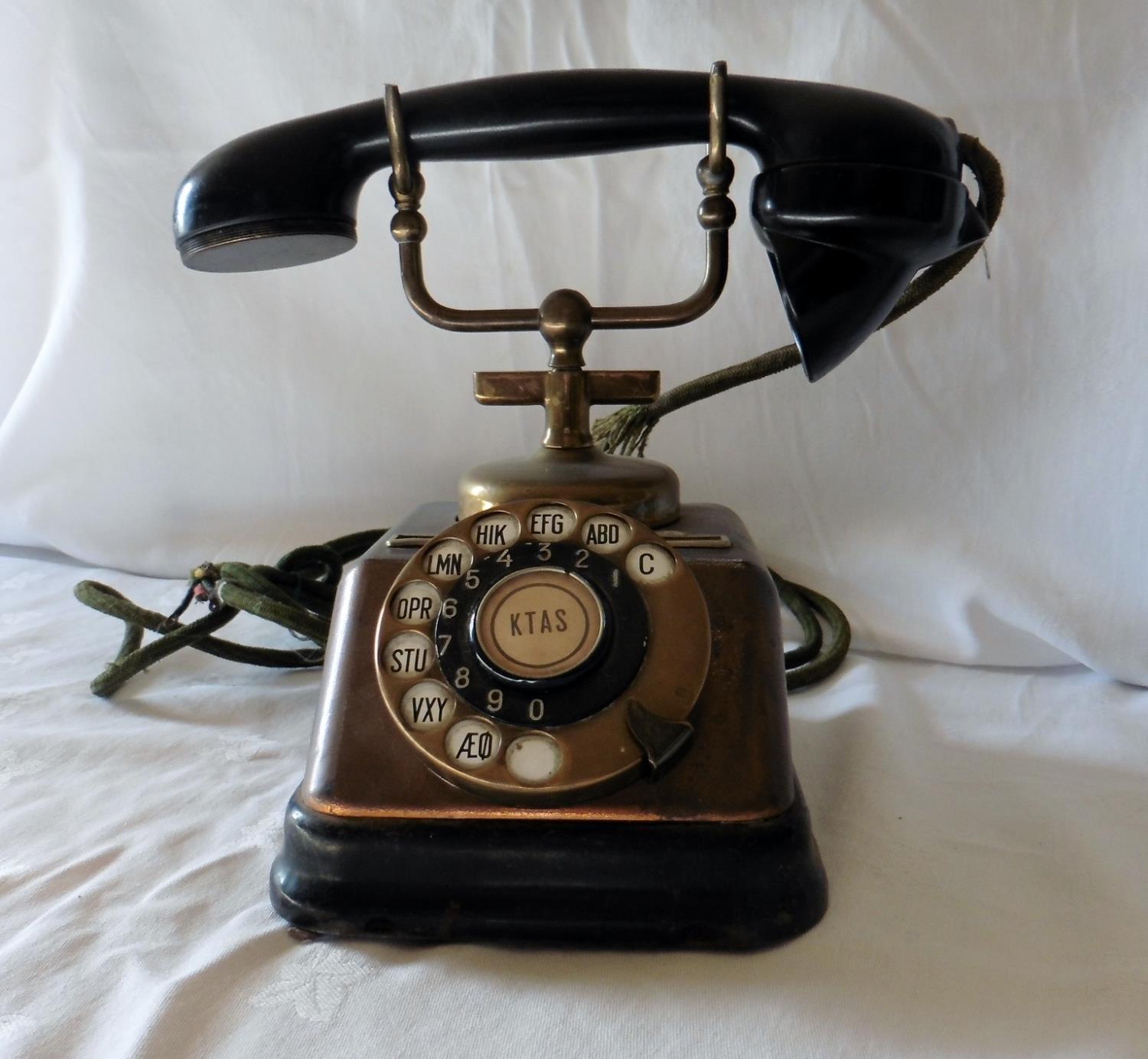 An Vintage Danish Rotary Telephone with a stylish handset and bell ...