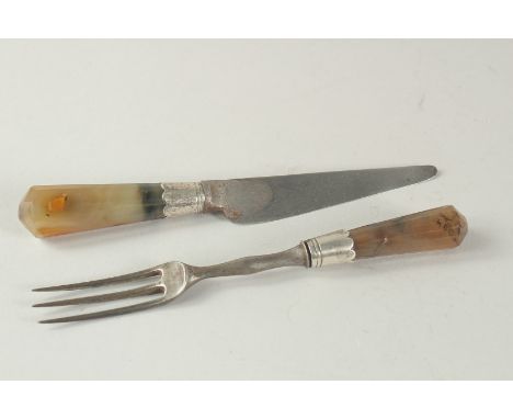 A 17TH - 18TH CENTURY KNIFE AND FORK with agate handles.
