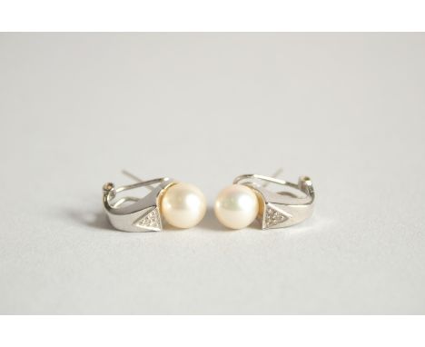 A PAIR OF WHITE GOLD, PEARL AND DIAMOND EAR CLIPS.