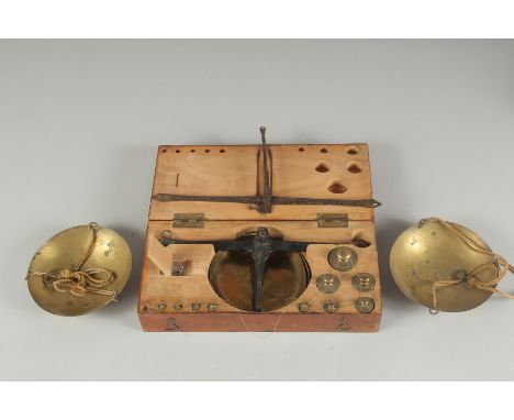 A BOXED SET OF SCALES AND WEIGHTS.