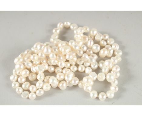 A GOOD CULTURED PEARL NECKLACE. 48ins long.