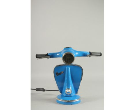 A BLUE VESPA LAMP.