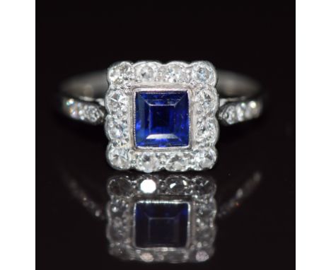 Art Deco 18ct white gold ring set with a square cut sapphire surrounded by diamonds, 2.3g, size N