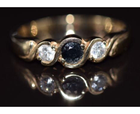 A 9ct gold ring set with a sapphire and cubic zirconia, 2.3g, size N