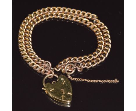 A 9ct gold double strand curb link bracelet, originally a fob chain, with heart padlock clasp, 25.1g
