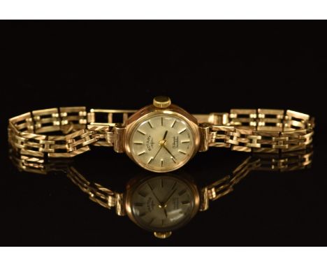 Rotary 9ct gold ladies wristwatch with two-tone hands and baton hour markers, silver dial and signed 17 jewel movement, on 9c