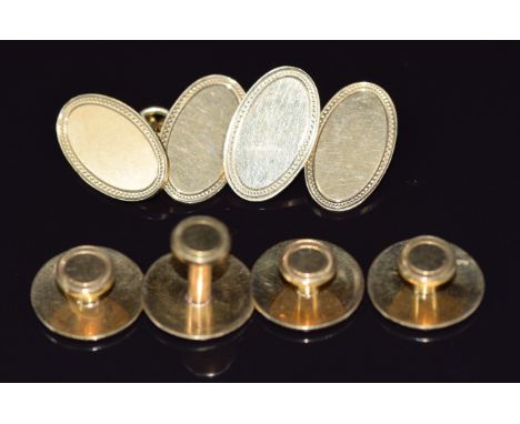 A pair of 18ct gold cufflinks, Birmingham 1929, and 18ct gold studs, 22.6g