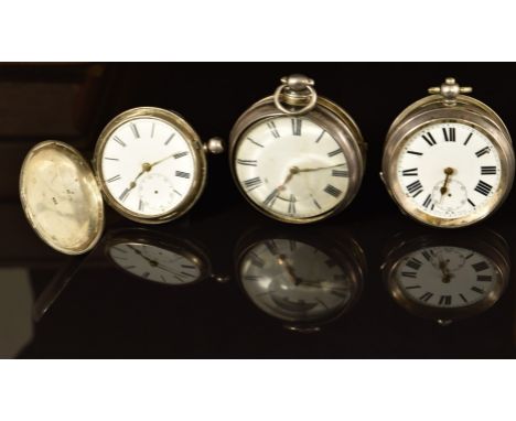 Three unnamed hallmarked silver pocket watches comprising a pair cased example with gold hands, black Roman numerals, white e