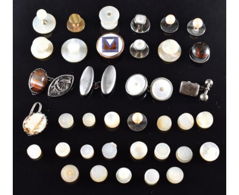 A collection of mother of pearl studs, silver stud set with agate, Victorian stud set with enamel, three single silver cuffli