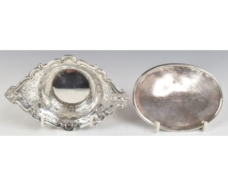 Silver bon bon dish with pierced and embossed decoration, marked sterling, length 14cm, weight 50g, together with a small ova