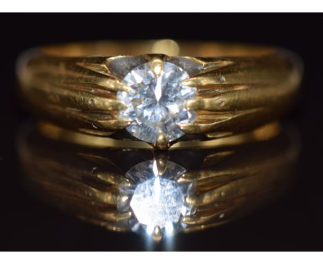 An 18ct gold ring set with a round cut diamond of approximately 0.92ct, 9.2g, size R