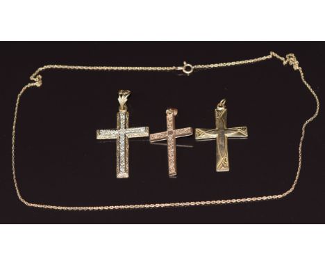 Three 9ct gold cross pendants and a 9ct gold chain, 8.4g&nbsp;