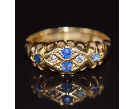 An 18ct gold ring set with sapphires and diamonds, Birmingham 1912, 2.5g, size L