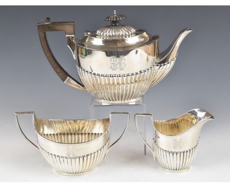 Edward VII hallmarked silver three piece teaset with fluted lower bodies, Sheffield 1903/4, maker&nbsp;James Deakin &amp; Son