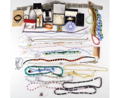 A collection of costume jewellery including beads, Art Deco French pin, garnet necklace, enamel butterfly brooch, watches, et