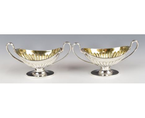 Pair of Victorian hallmarked silver twin handled open salts with gilt wash interiors, London 1886, maker&nbsp;William Hutton 